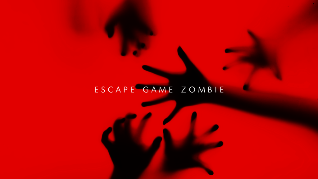 escape game zombie silhouette de mains sur une toile rouge à contre jour